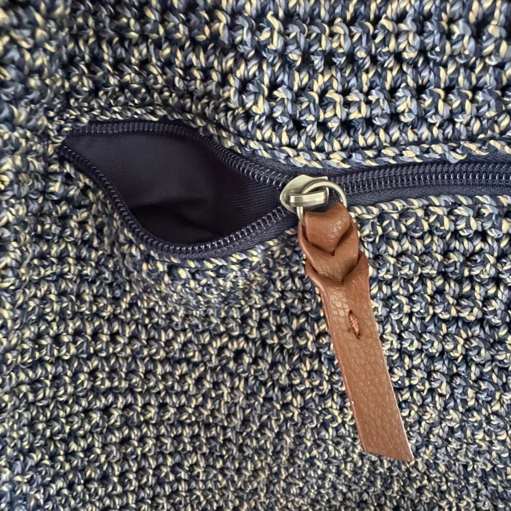 The Sak Brown & Navy Woven Backpack with Tassel Fringe and Embroidered Strap